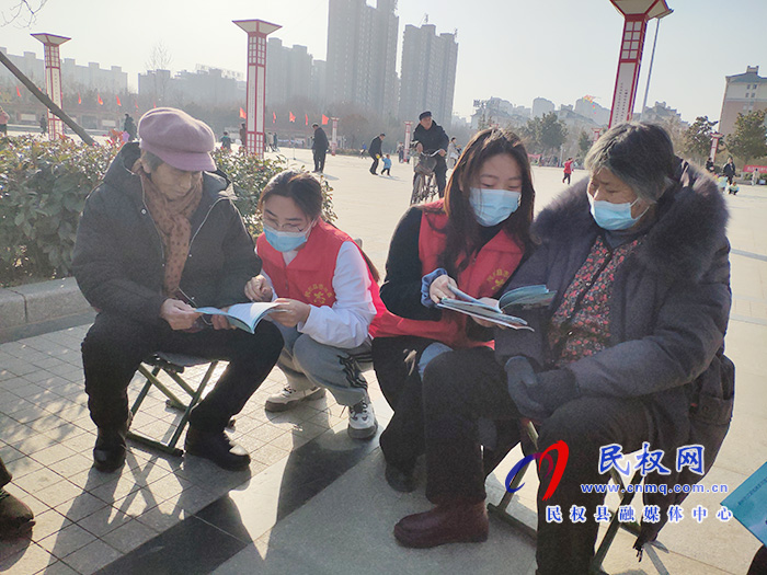 志愿者开展疫情防控迎新春宣传活动