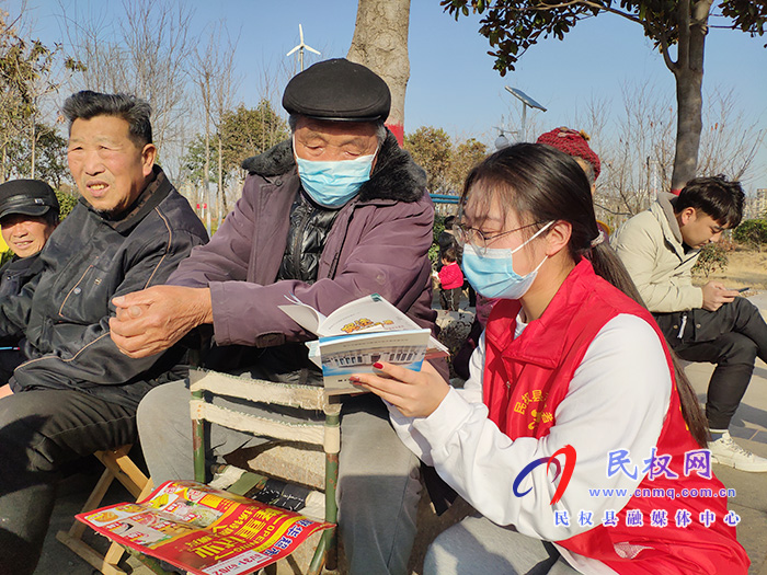 志愿者开展疫情防控迎新春宣传活动